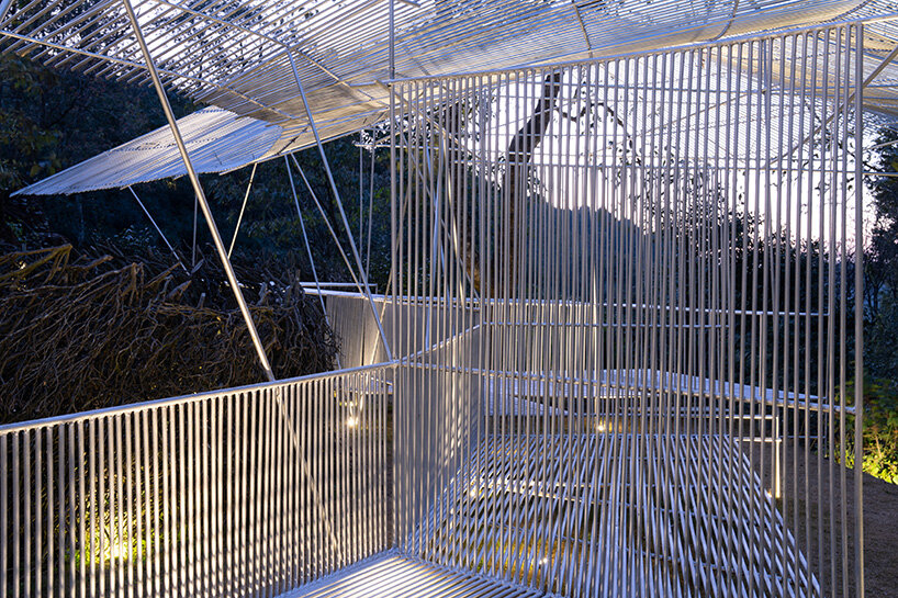 tea pavilion by kong xiangwei studio floats like a silver feather in chinese rainforest