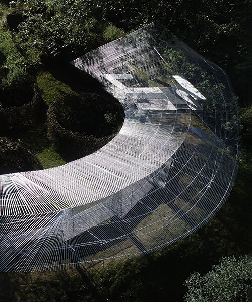 tea pavilion by kong xiangwei studio floats like a silver feather in chinese rainforest