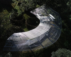 tea pavilion by kong xiangwei studio floats like a silver feather in chinese rainforest