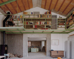 exposed materials animate textured decorative patterns within rural house in italy