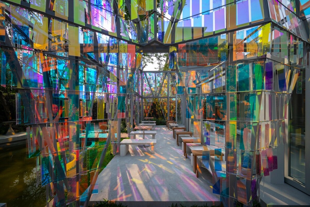iridescent panels evoking gemstones refract shifting hues at BBWORKSPACE’s thailand café