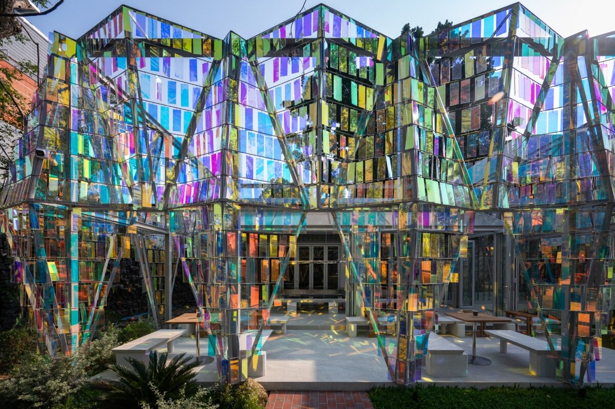 iridescent panels evoking gemstones refract shifting hues at BBWORKSPACE’s thailand café