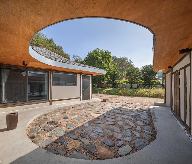 undulating roof crowns 50-year-old farmhouse renovation by drawing works in korea