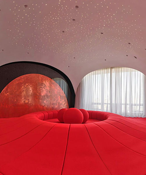 copper planet installation and red undulating seating anchor venus lounge by asap/ in beijing