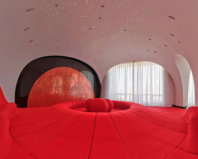 copper planet installation and red undulating seating anchor venus lounge by asap/ in beijing