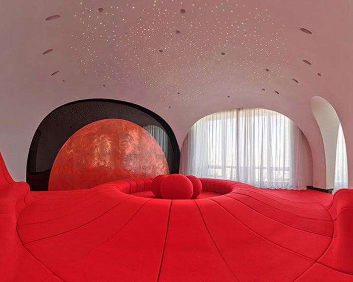 copper planet installation and red undulating seating anchor venus lounge by asap/ in beijing