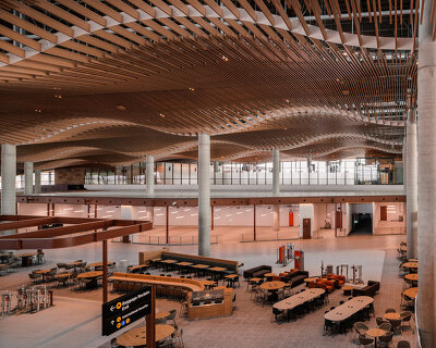 zaha hadid and woods bagot shape sydney airport terminal with undulating timber modules