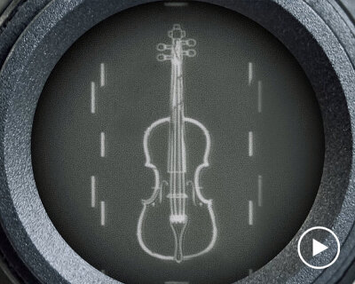 world’s smallest violin is so tiny it can fit inside human hair