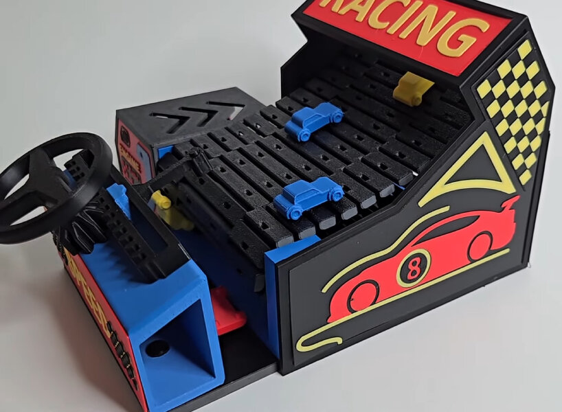 view of the red car after a car has crashed into it and the game ended