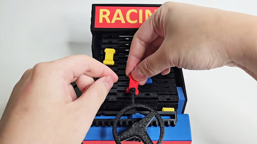 to restart the game, the user needs to stick the main car onto the pole above the steering wheel