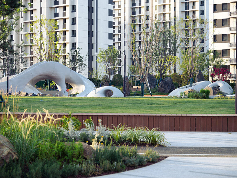 3D printed concrete caves resemble stone formations in chinese playground by XISUI design