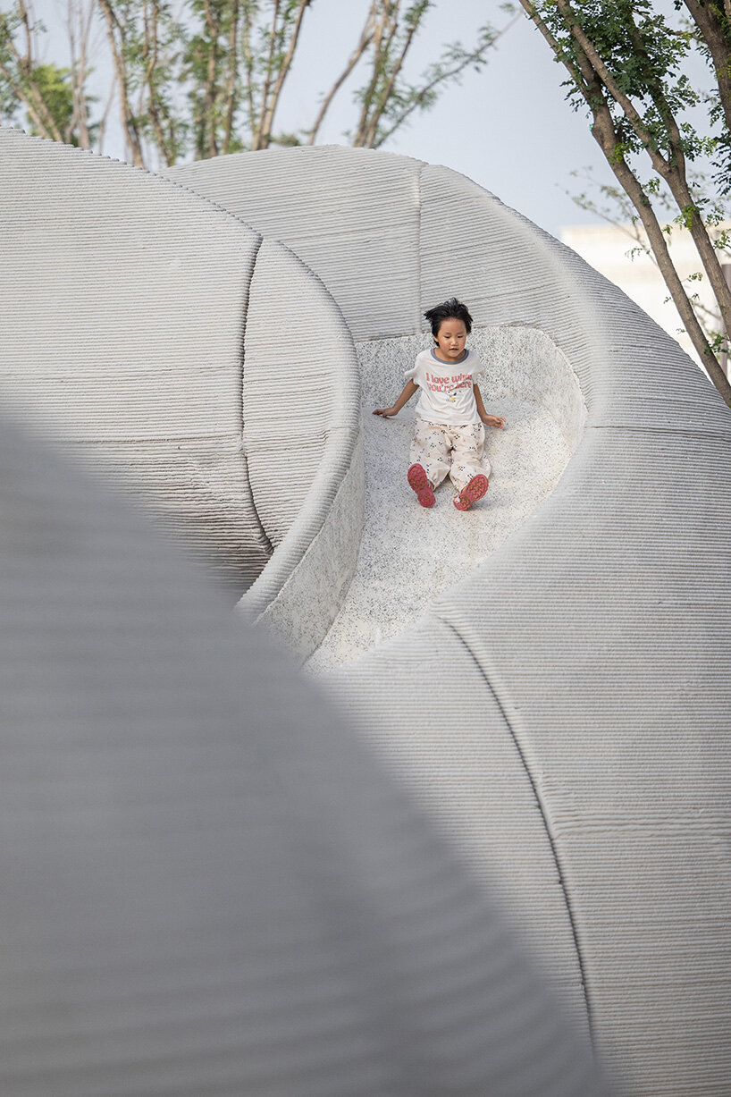 3D printed concrete caves resemble stone formations in chinese playground by XISUI design