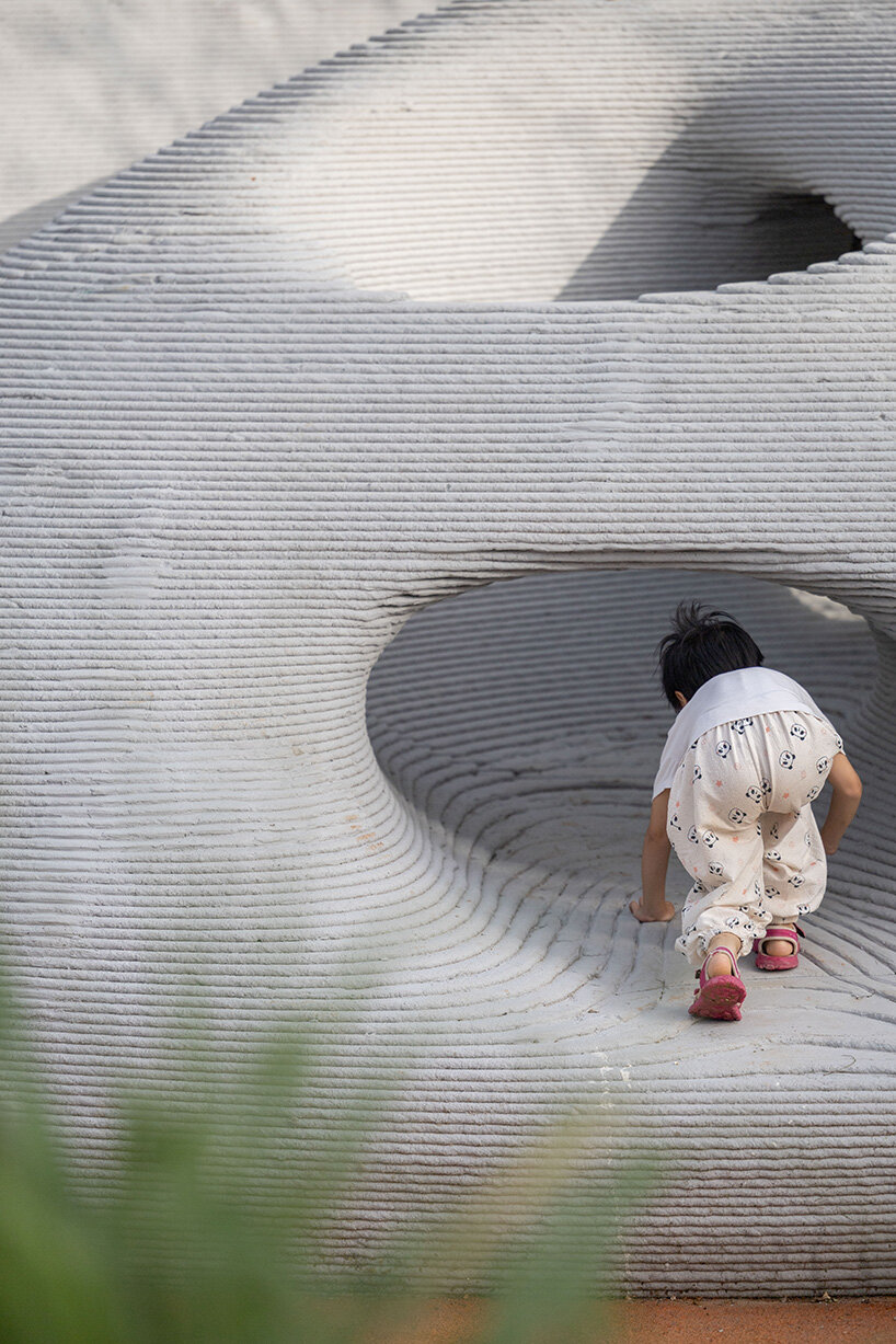 3D printed concrete caves resemble stone formations in chinese playground by XISUI design