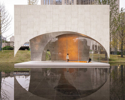 atelier xi unveils public art center as a landscape of four travertine pavilions in china