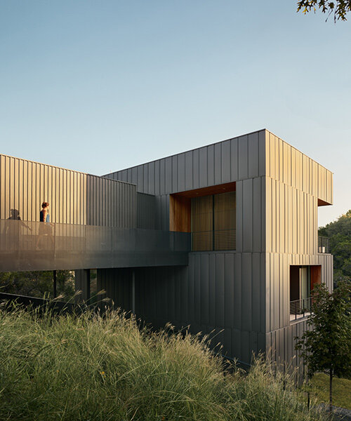alterstudio's falcon ledge residence climbs a steep ravine outside austin, texas