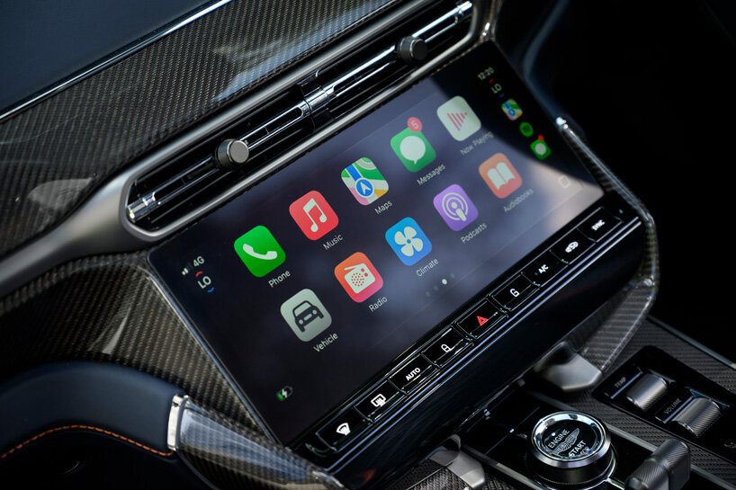 design drive: aston martin vanquish volante convertible exhilarates rain or shine