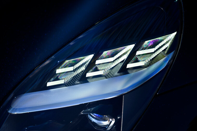 design drive: aston martin vanquish volante convertible exhilarates rain or shine