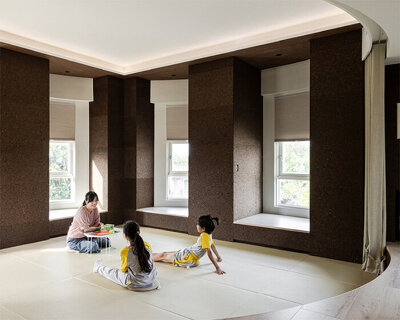 atelier boter shapes circular room around sunken square in taiwanese school