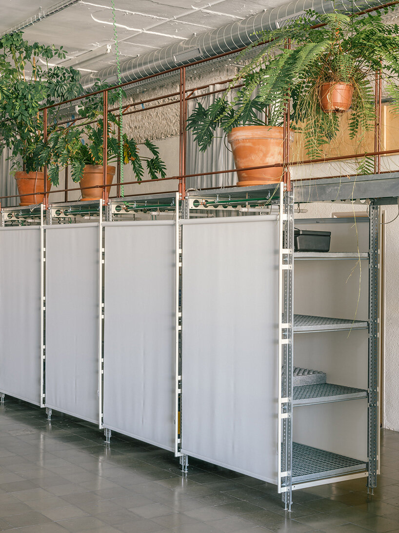 atienza maure converts barcelona warehouse into live-work space using industrial systems