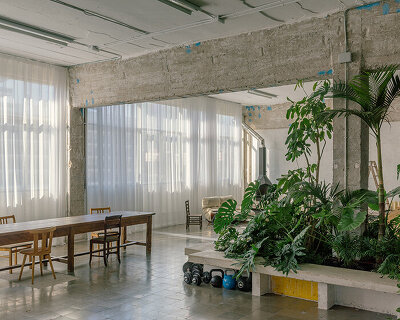 atienza maure converts barcelona warehouse into live-work space using industrial systems