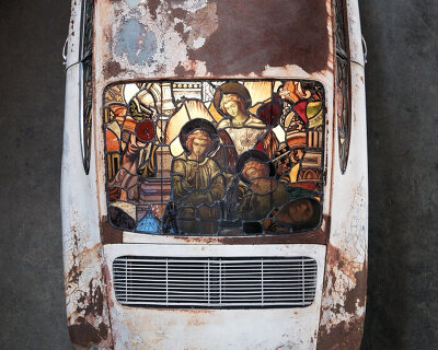 ben tuna resurrects corroded porsche 911 into art car with cathedral-inspired stained glass