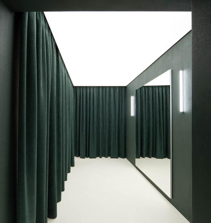 between the walls preserves shell rock from soviet past at sculptural showroom in kyiv