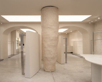 between the walls preserves shell rock from soviet past at sculptural showroom in kyiv