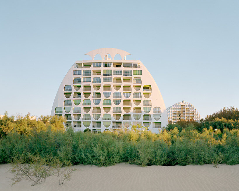 broyez and kronental capture french seaside resort as sci-fi mirage at dawn in 'la cité oasis'