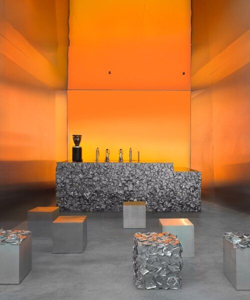 warm orange glow bathes crosby studios' chromatic café nuances in paris 