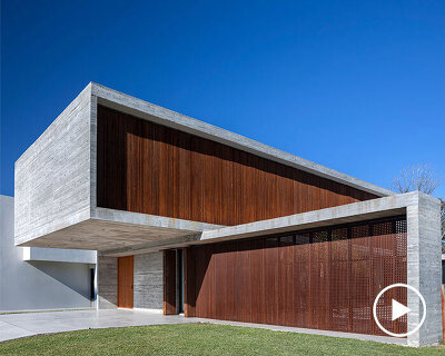 TIM arquitectos combines concrete and corten steel for casa guayubira in buenos aires