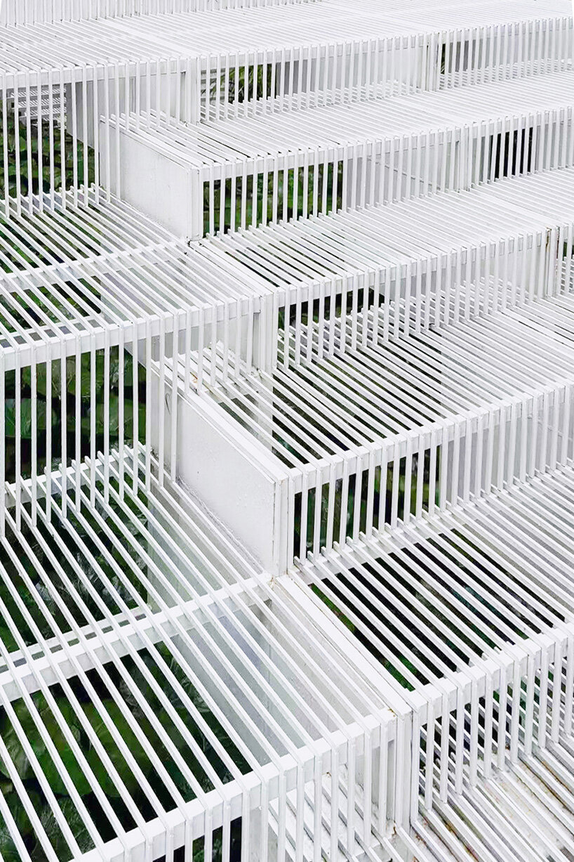 cascading staircase threads through sunken courtyard by TROP at shanghai residence