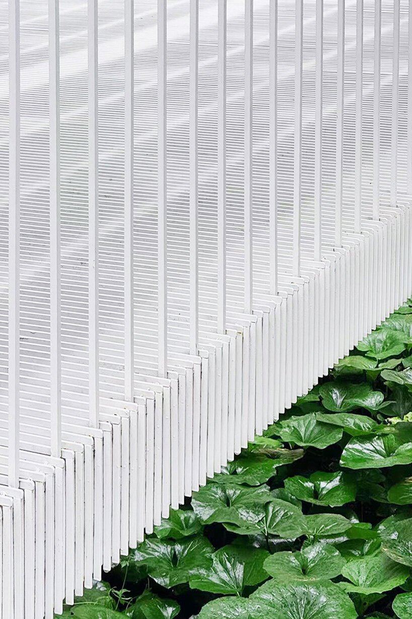 cascading staircase threads through sunken courtyard by TROP at shanghai residence
