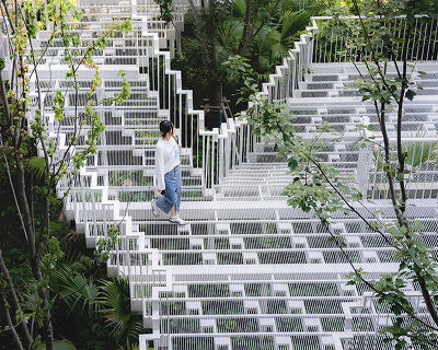 cascading staircase threads through sunken courtyard by TROP at shanghai residence