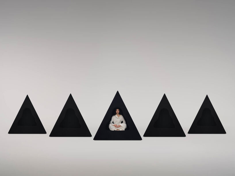 pyramidal cave chair by domain architects for bischiyano shapes retreat for secluded comfort