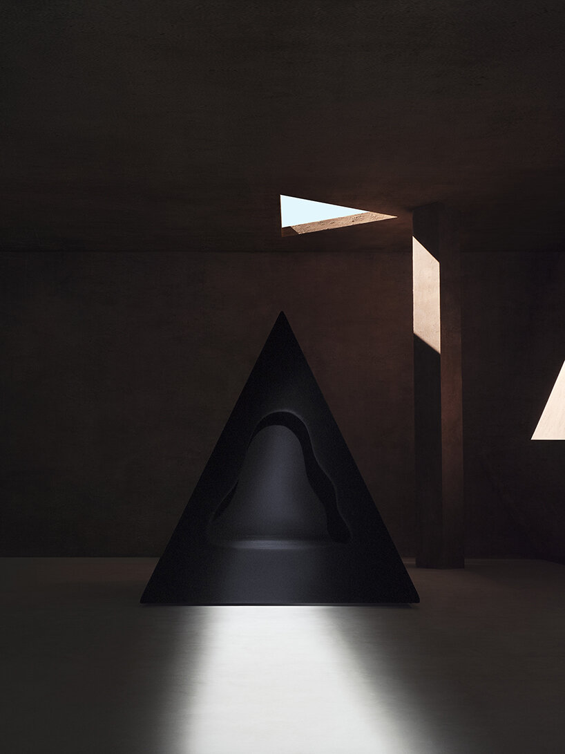 pyramidal cave chair by domain architects for bischiyano shapes retreat for secluded comfort