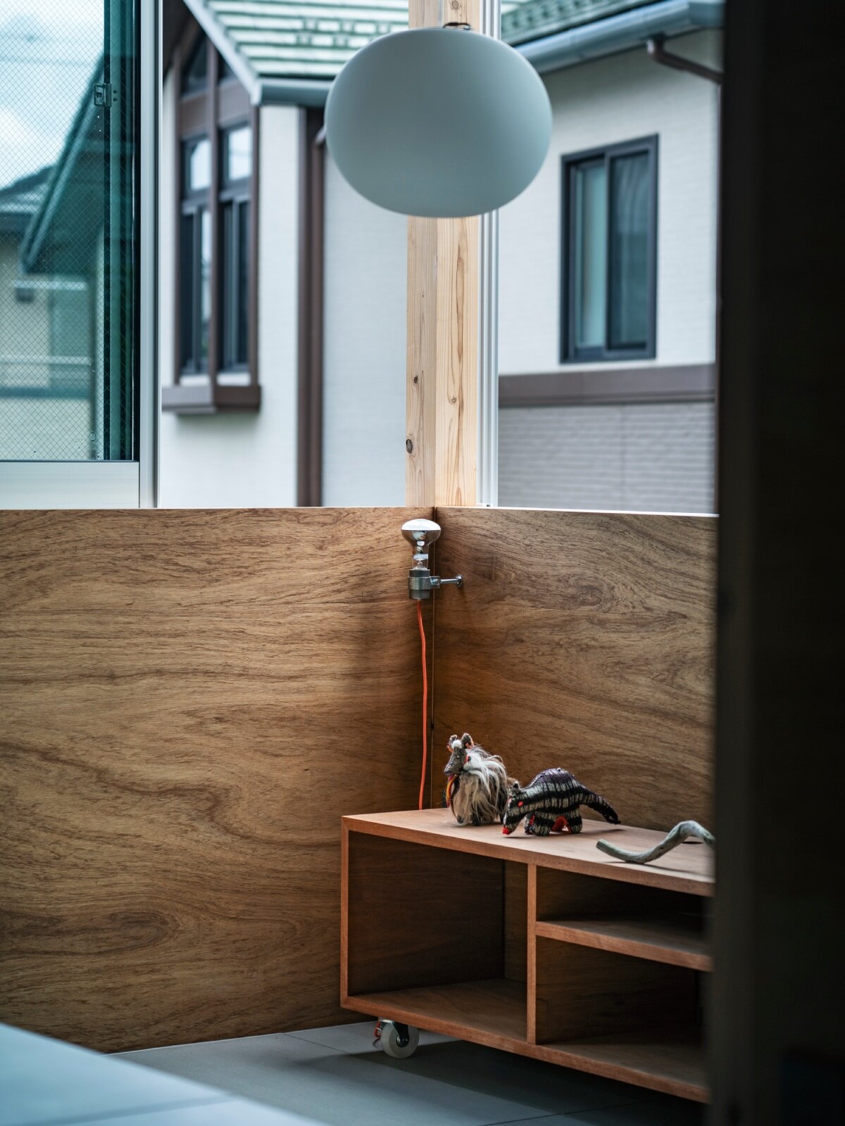 tamada & wakimoto's multigenerational home in japan unfolds in stepped levels 