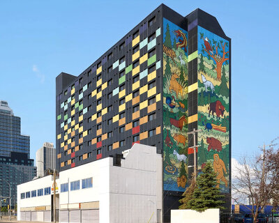 colorful solar facades and photovoltaic murals power up the sunrise tower in alberta, canada