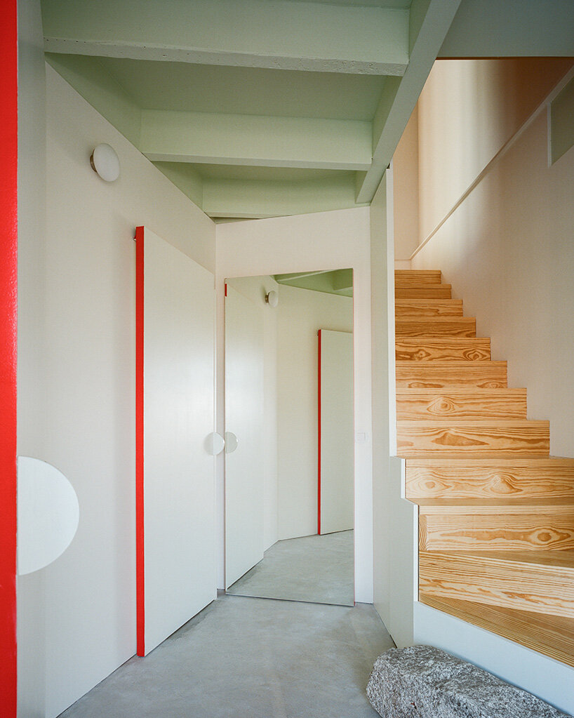 cork-clad house in portugal gets upside-down layout through atelier local's redesign