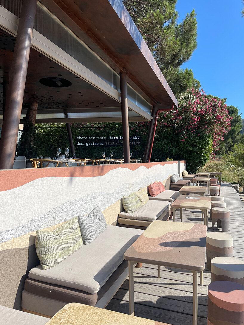 CTRLZAK channels filtered forest light in pine-inspired restaurant at ekies resort, greece