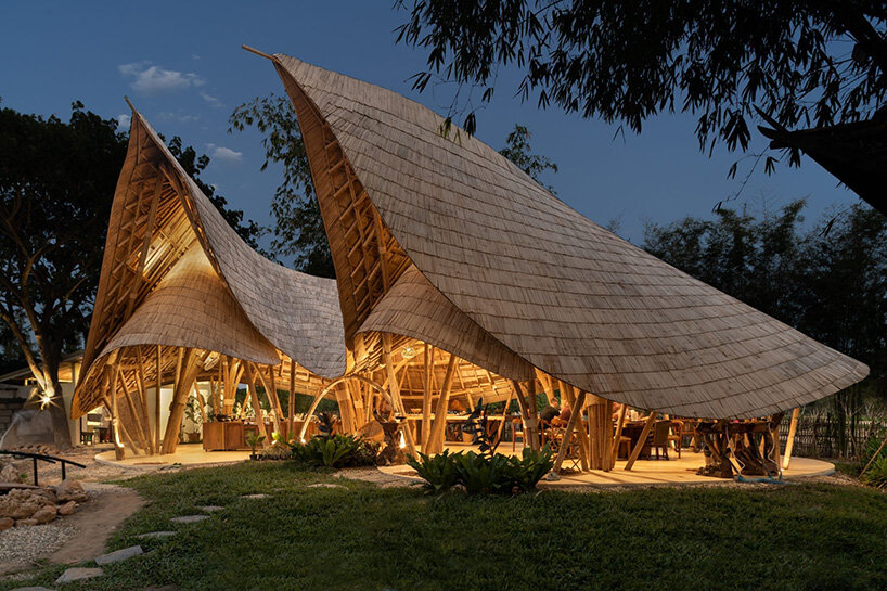 curved edges rise to form bull-like bamboo pavilion by chiangmai life architects in thailand