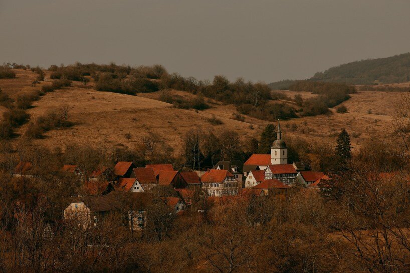 david altrath captures eerie stillness of bonnland, an abandoned military village in germany
