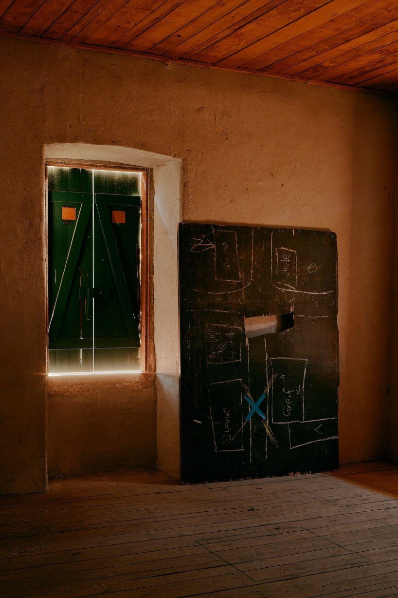 david altrath captures eerie stillness of bonnland, an abandoned military village in germany