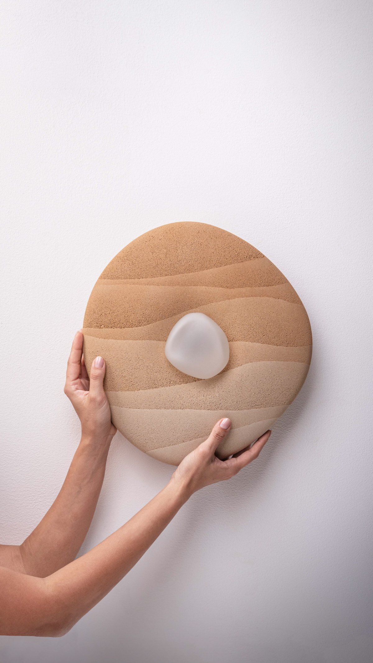 karim+elias give desert sand new form with luminous wall lamps and sculptural vases