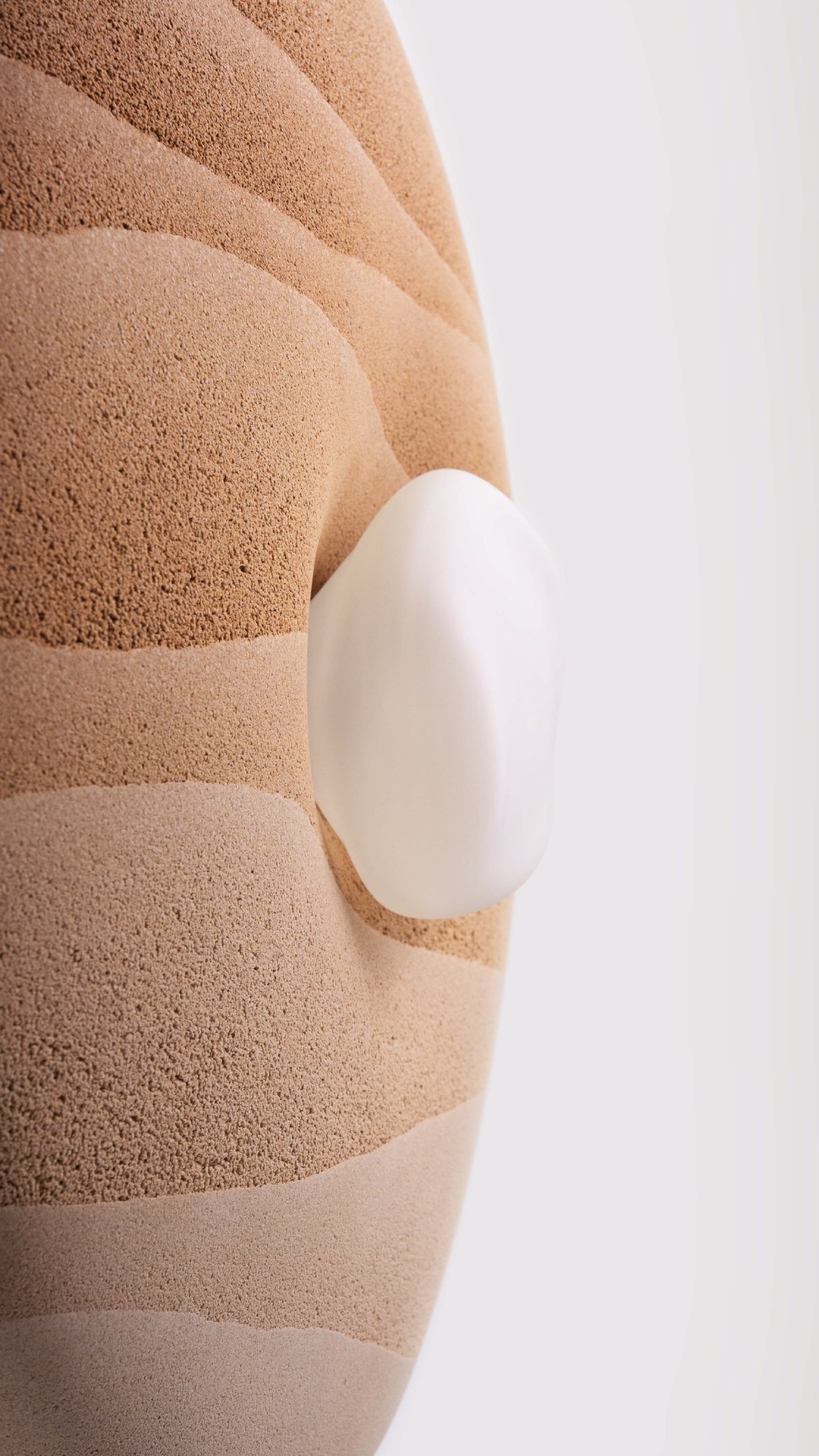 karim+elias give desert sand new form with luminous wall lamps and sculptural vases