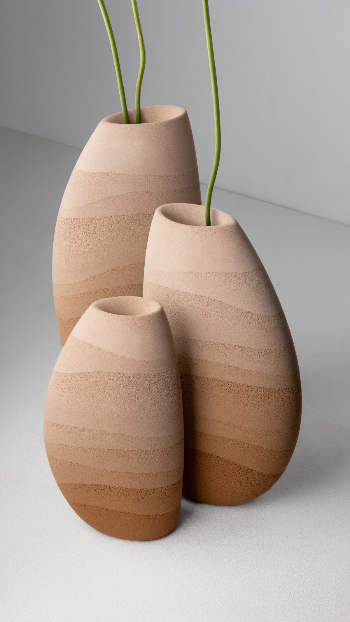 karim+elias give desert sand new form with luminous wall lamps and sculptural vases