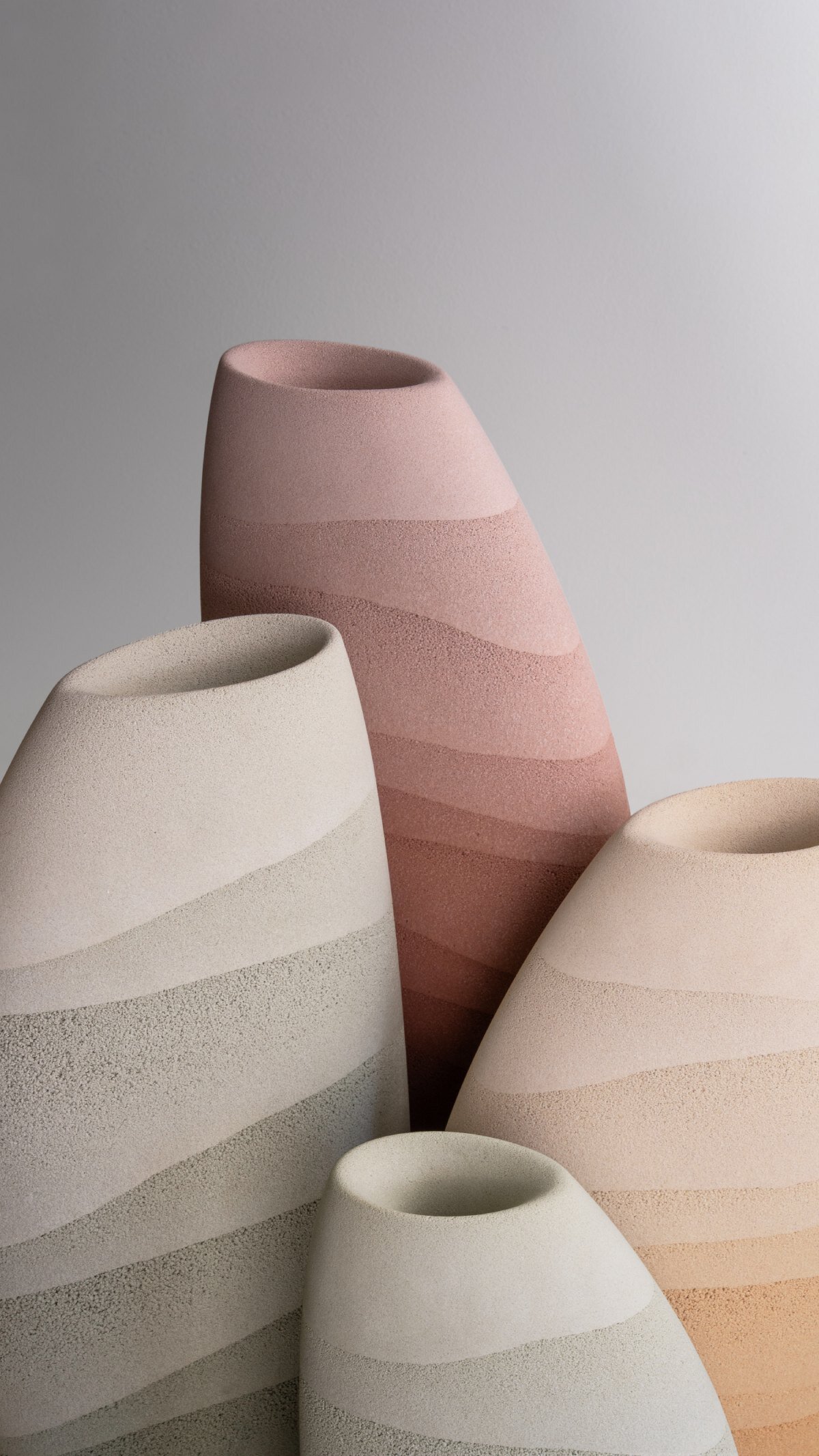 karim+elias give desert sand new form with luminous wall lamps and sculptural vases