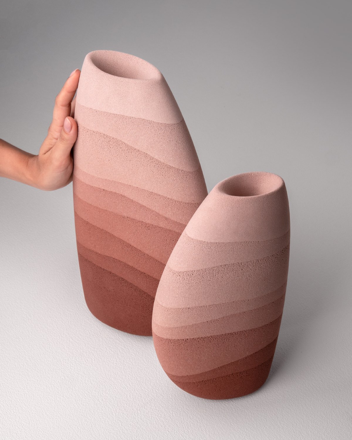 karim+elias give desert sand new form with luminous wall lamps and sculptural vases