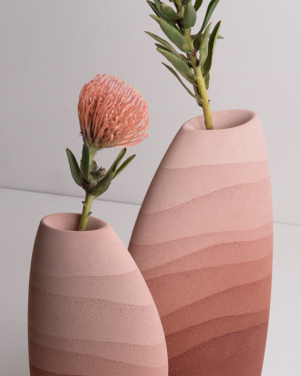 karim+elias give desert sand new form with luminous wall lamps and sculptural vases
