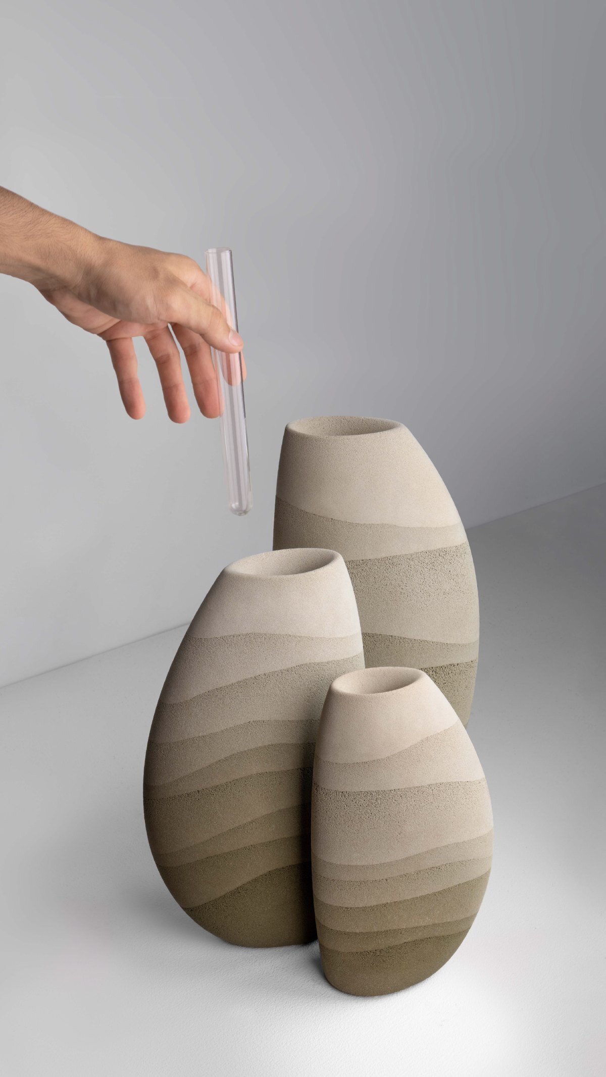 karim+elias give desert sand new form with luminous wall lamps and sculptural vases