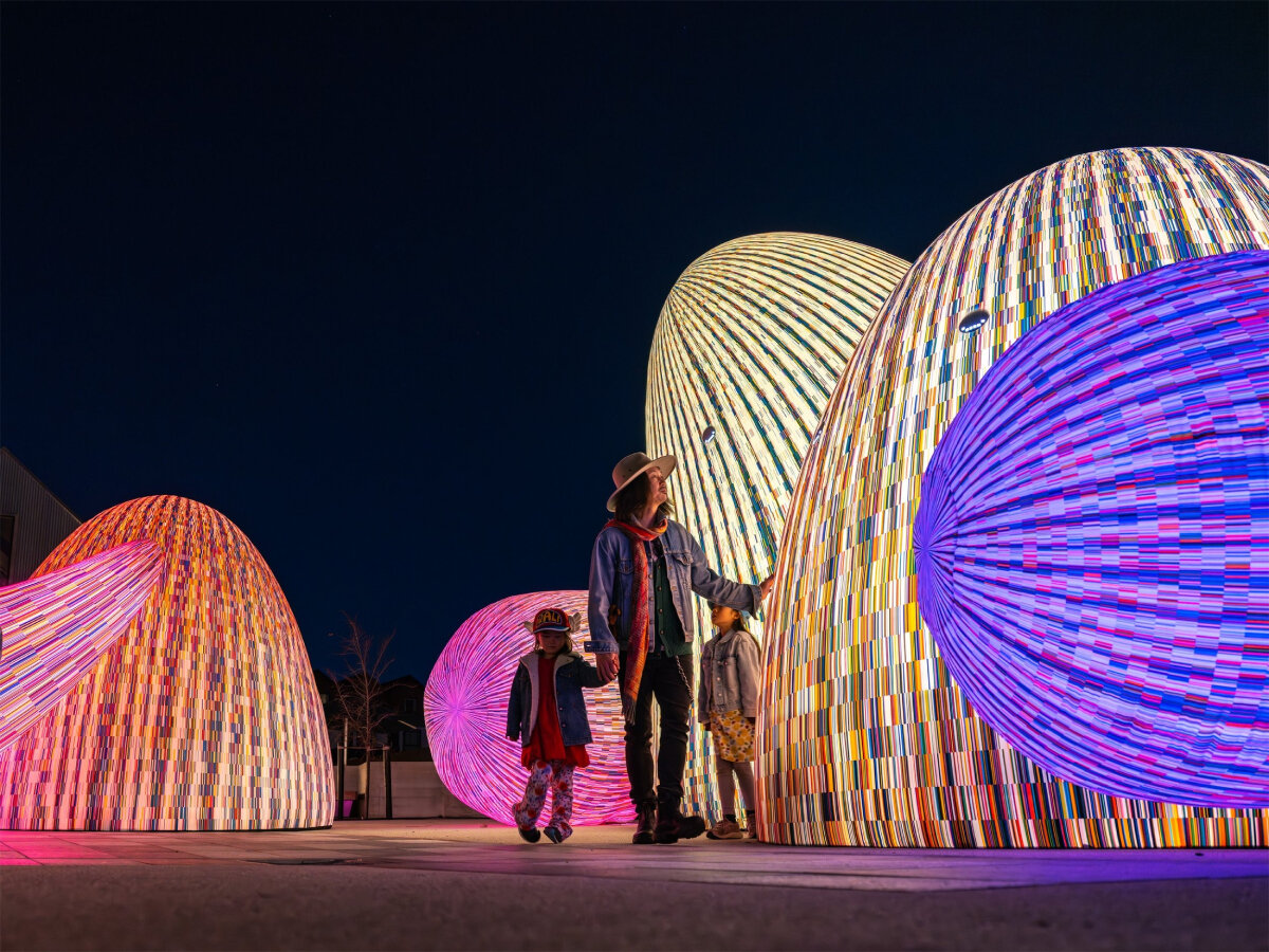 ENESS' glowing, interactive AI oracles question digital futures near new zealand mountains